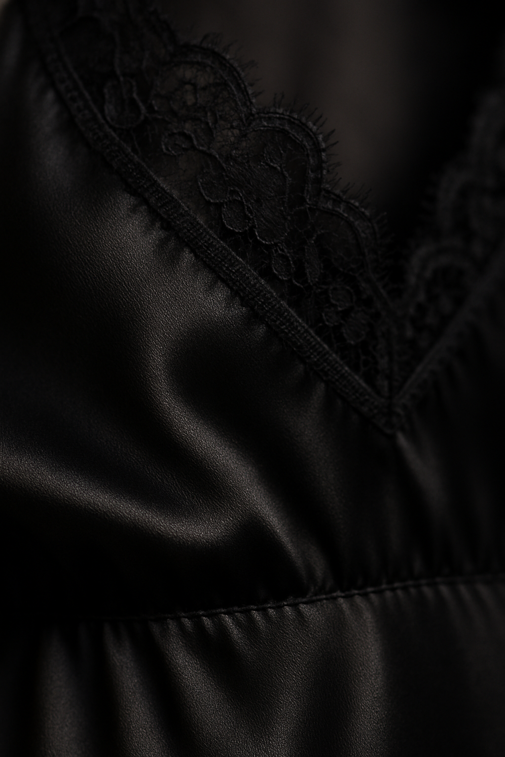 Black silk dress with lace trim detail